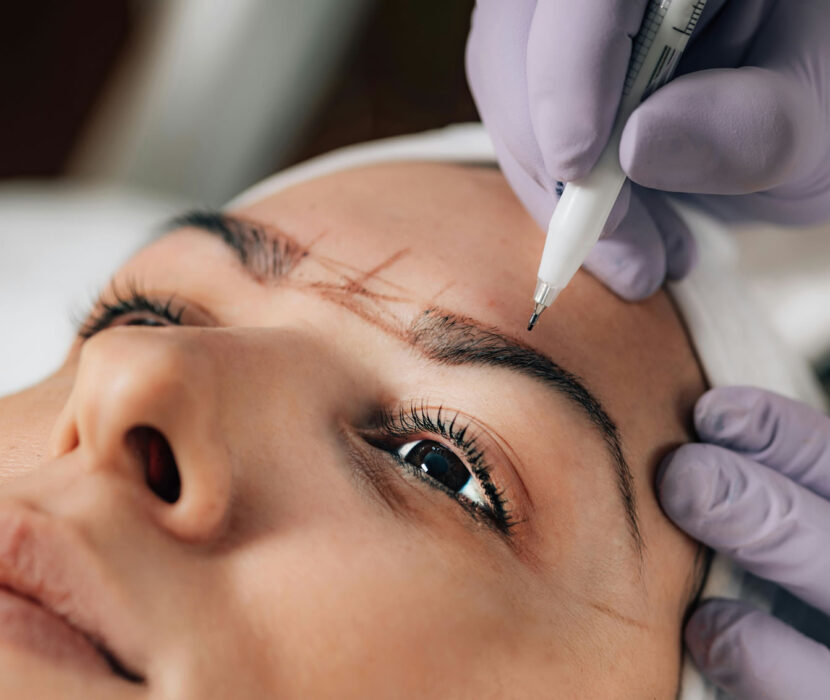 Woman client being prepared for permanent cosmetics procedure.